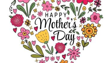 Happy mothers day flowers shaped like a heart